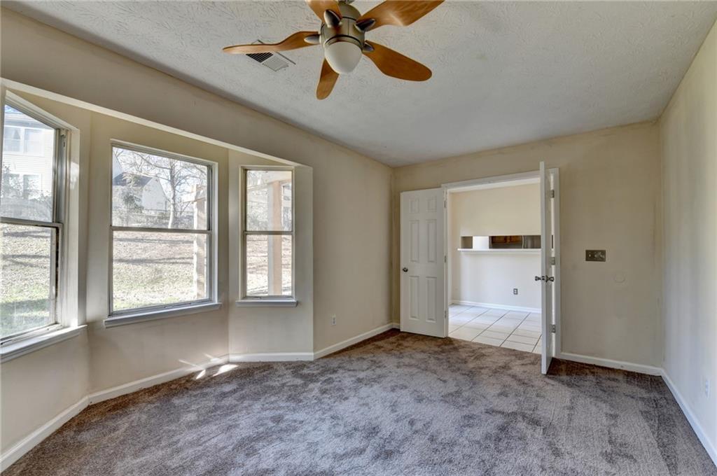 2082 Montgomery Trail Duluth, GA 30096 - Photo 25 of 45 a view of an empty room with a window