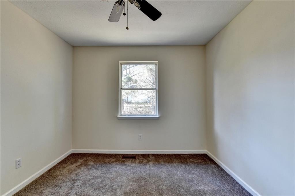 2082 Montgomery Trail Duluth, GA 30096 - Photo 30 of 45 an empty room with a window