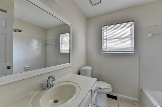a bathroom with a sink and a toilet