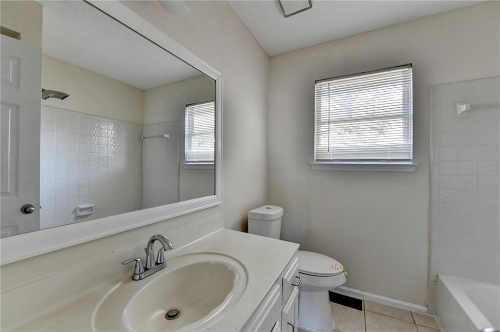 2082 Montgomery Trail Duluth, GA 30096 - Photo 32 of 45 a bathroom with a sink and a toilet
