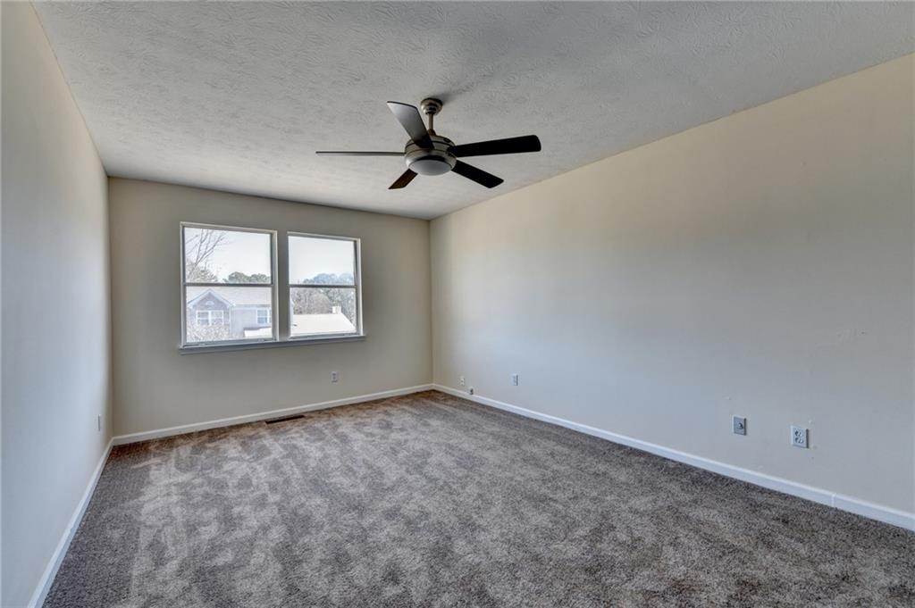 2082 Montgomery Trail Duluth, GA 30096 - Photo 33 of 45 a view of an empty room with a window