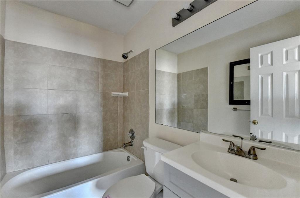 2082 Montgomery Trail Duluth, GA 30096 - Photo 37 of 45 a bathroom with a sink toilet and shower