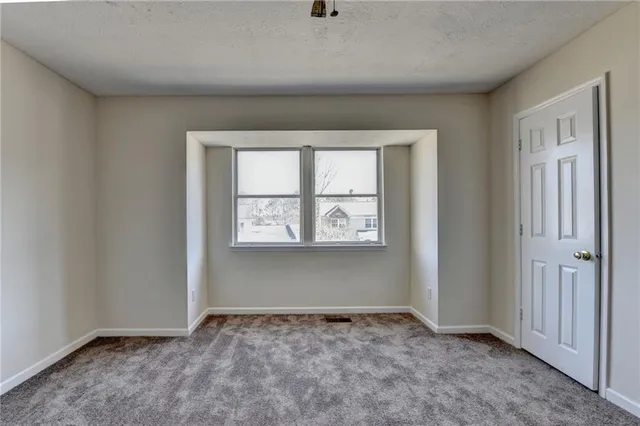 an empty room with window