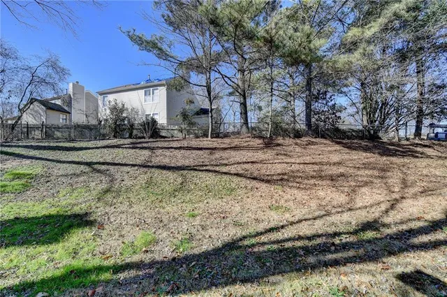 a view of a yard in front of a house