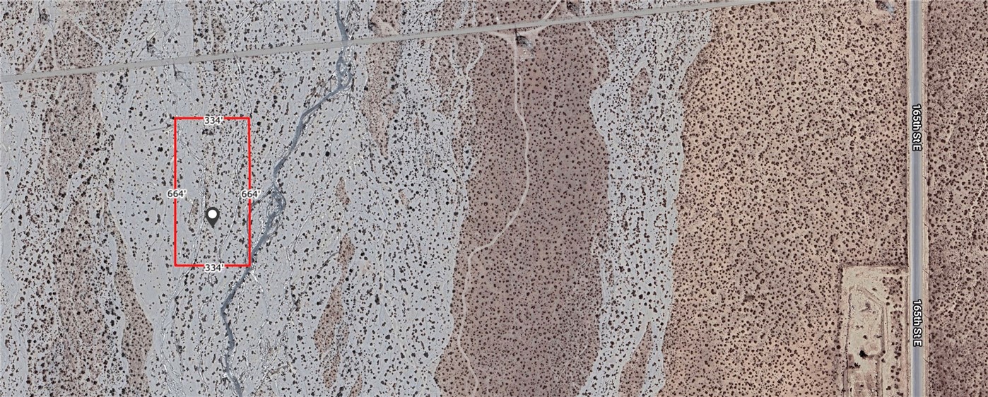 158 West Ave U Llano, CA 93544 - Photo 1 of 1 a bathroom with a shower curtain