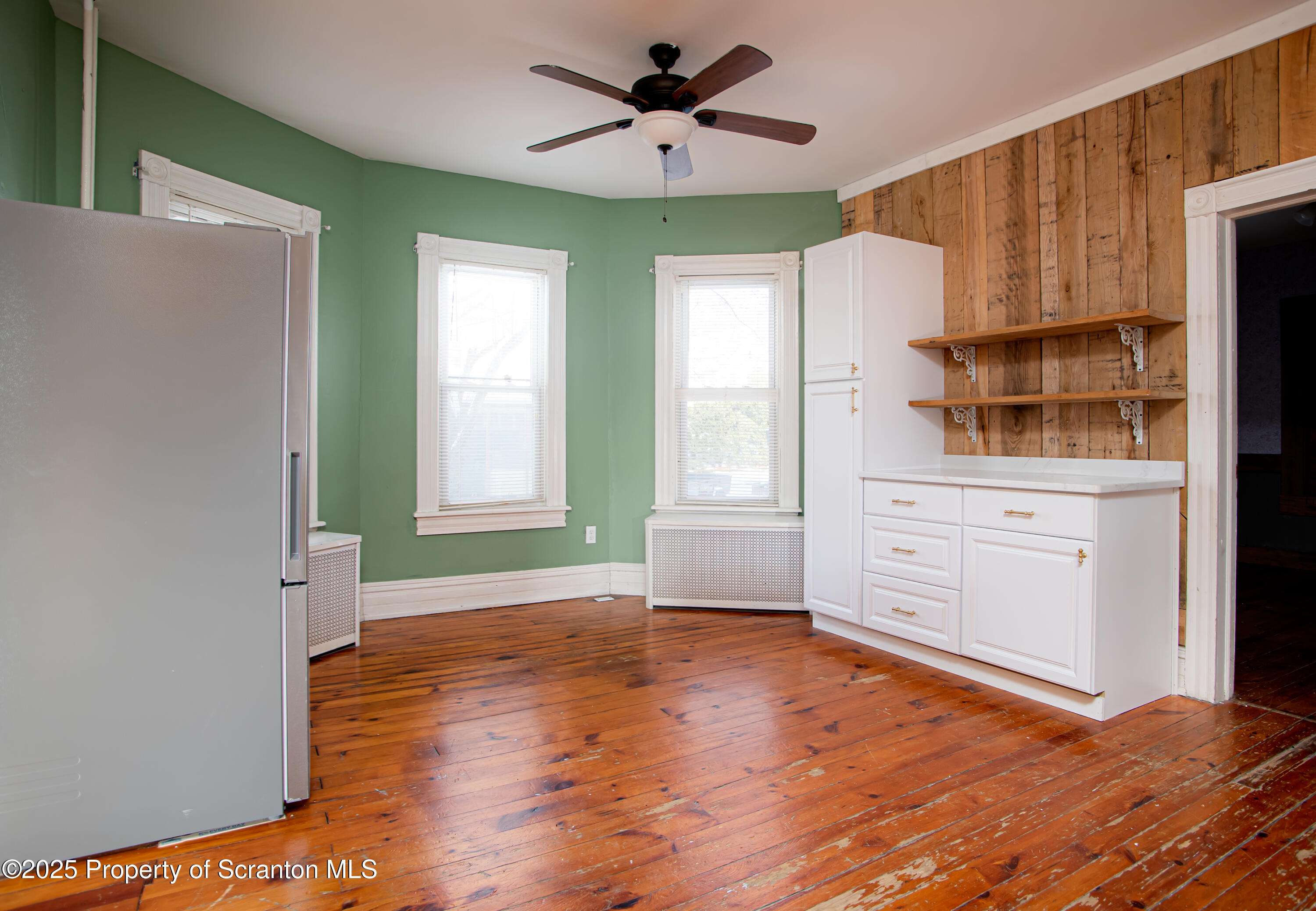 28 Pine Street Tunkhannock, PA 18657 - Photo 13 of 50 a view of a kitchen with wooden floor and a kitchen space