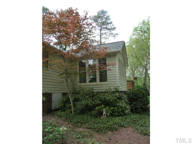 2208 Corberrie Lane Raleigh, NC 27613 - Photo 23 of 25 a view of a house with a yard