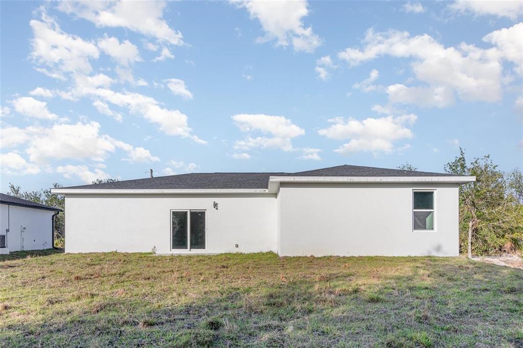 13451 Kaplan Terrace Port Charlotte, FL 33981 - Photo 24 of 27 a view of backyard of house