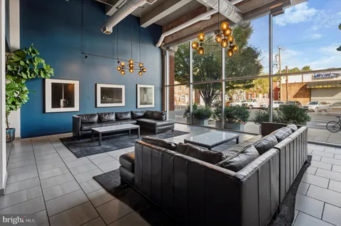 a outdoor space with patio furniture and potted plants