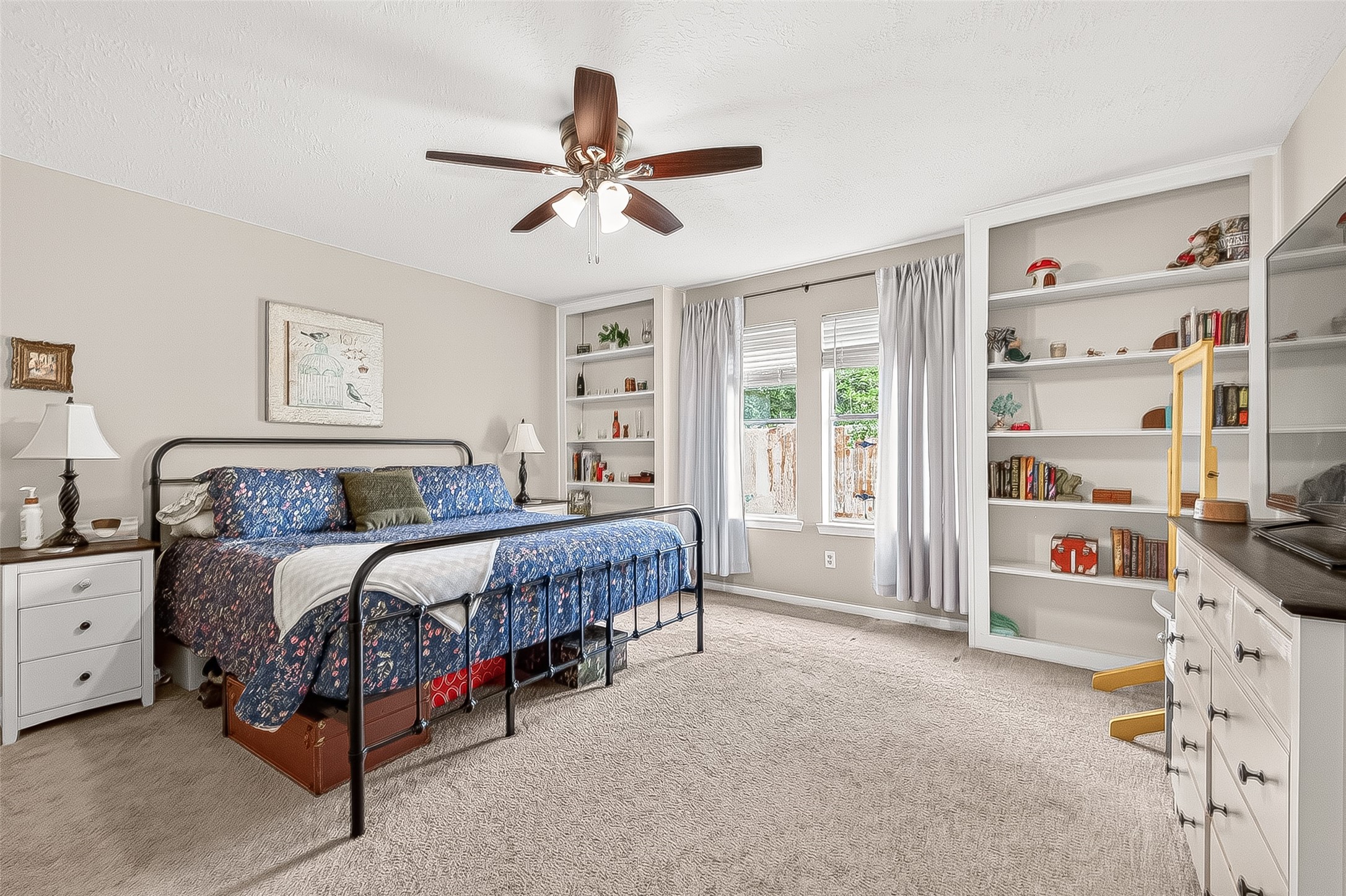 17611 Sorrell Ridge Drive Spring, TX 77388 - Photo 44 of 50 a bedroom with a bed and a window
