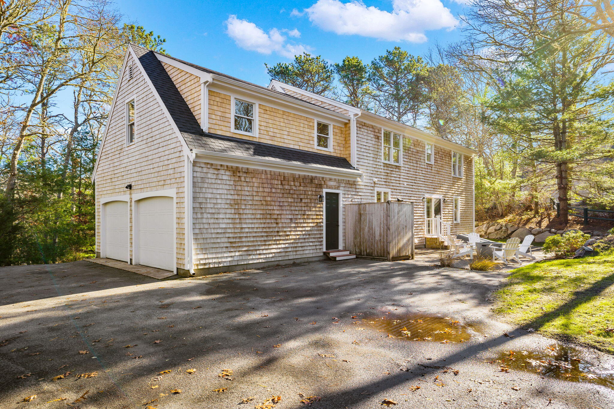 992 Bumps River Road Centerville, MA 02632 - Photo 24 of 33 a view of a house with a patio