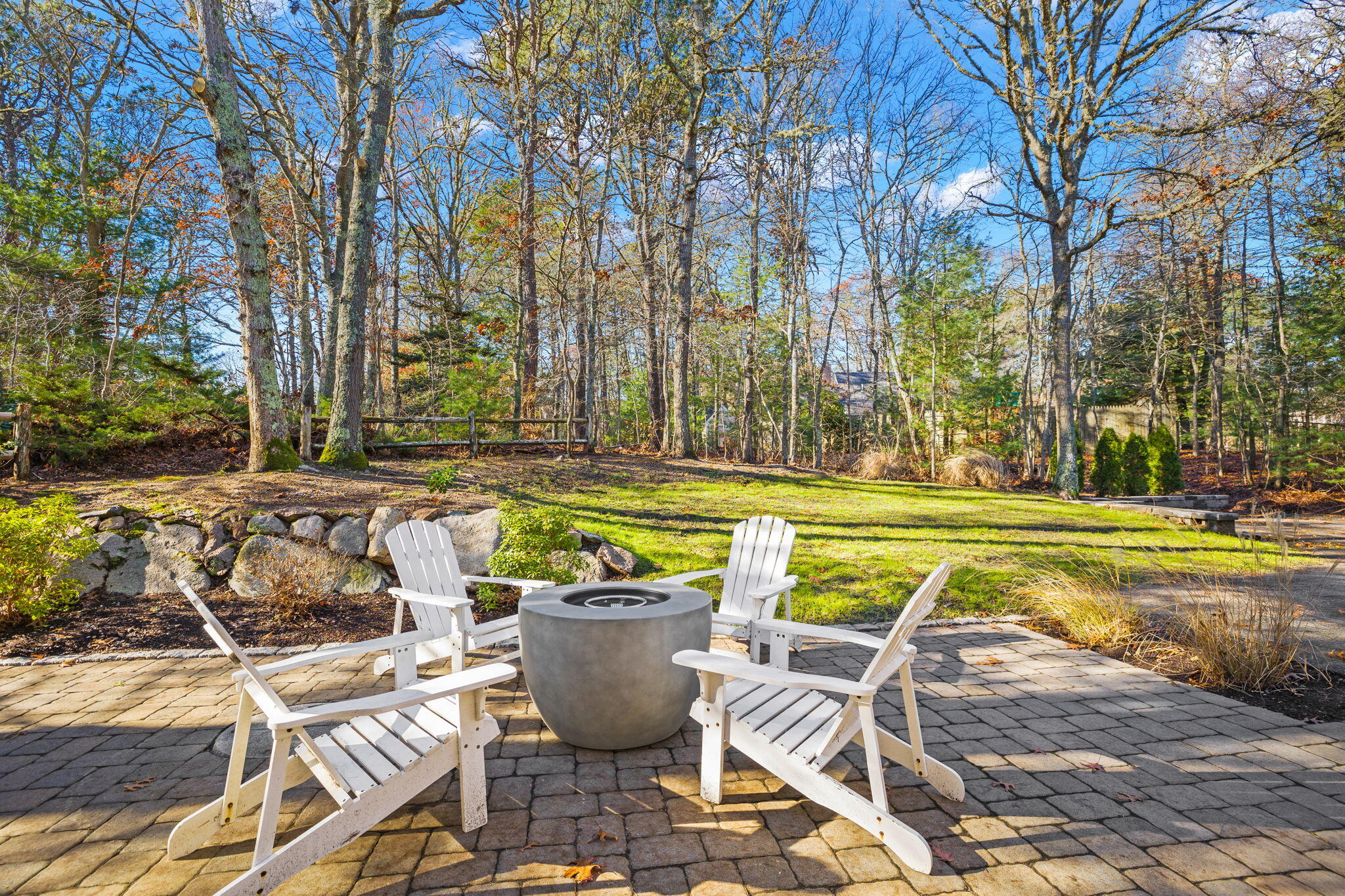 992 Bumps River Road Centerville, MA 02632 - Photo 28 of 33 a view of swimming pool with lawn chairs and plants