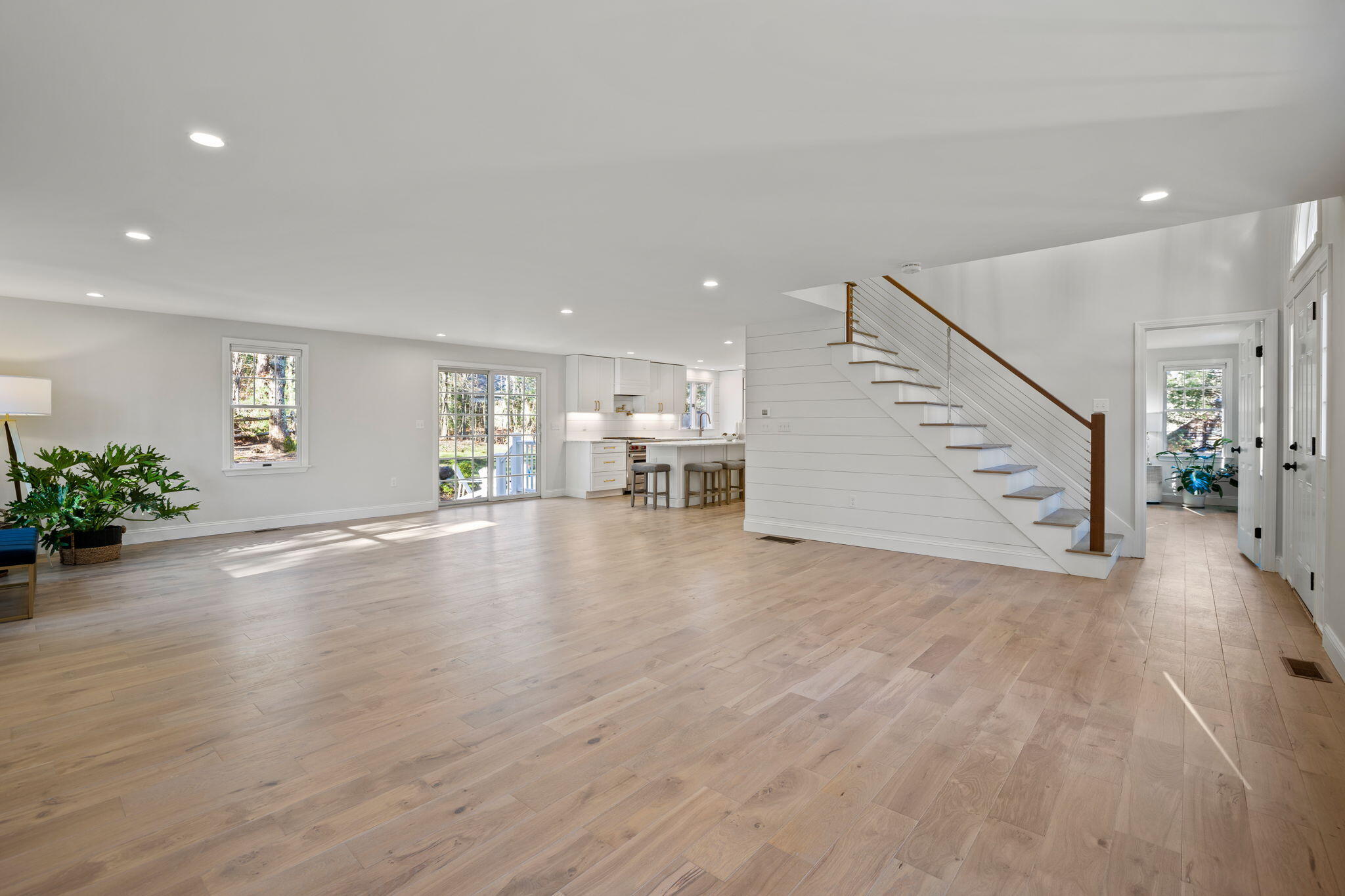 992 Bumps River Road Centerville, MA 02632 - Photo 5 of 33 an empty room with wooden floor and entryway