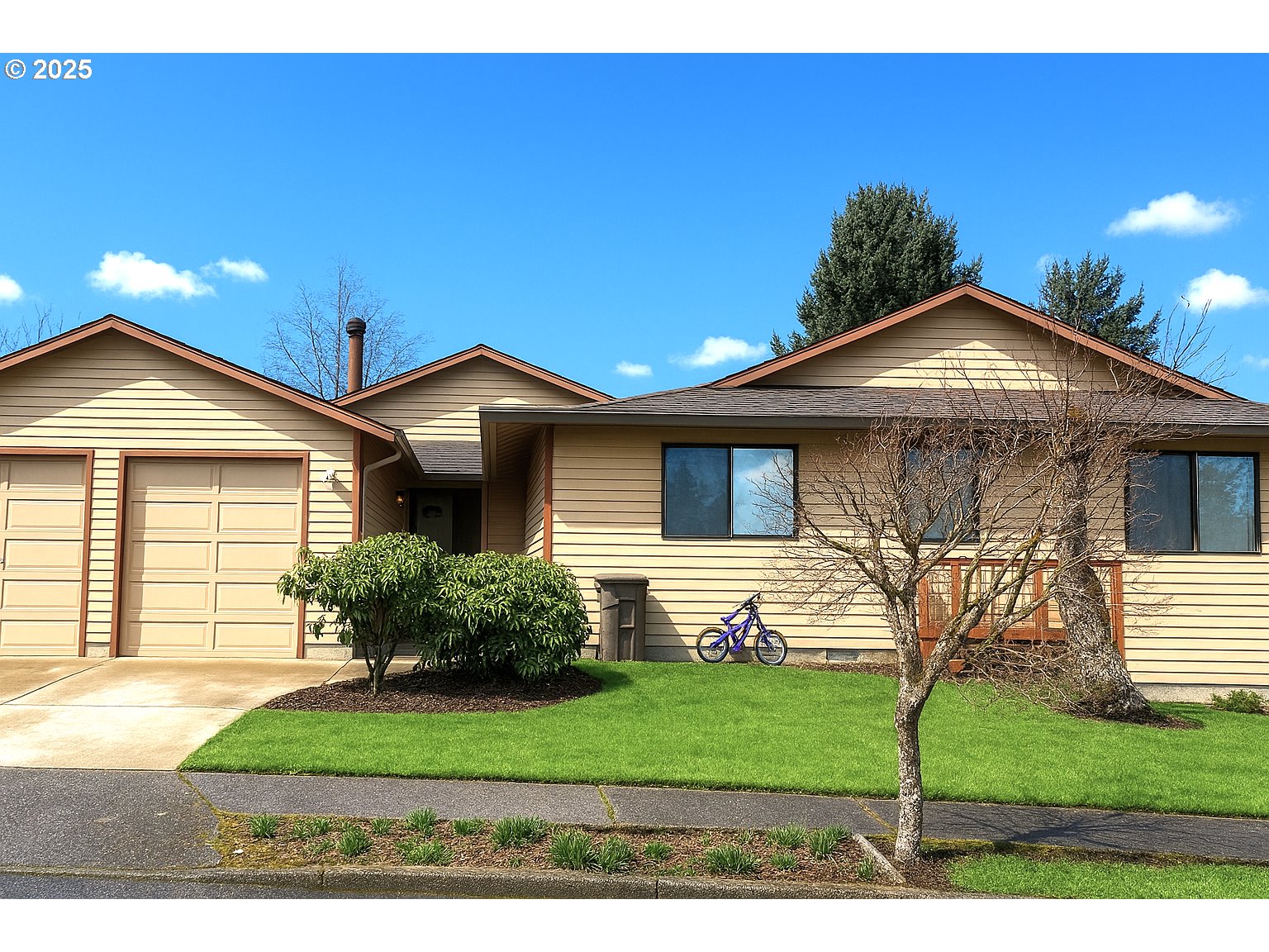 a front view of a house with a yard