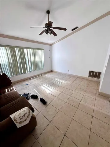 a view of a livingroom with furniture and furniture