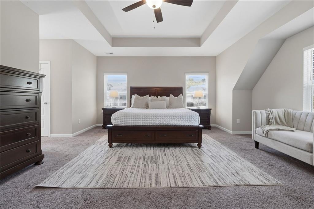 166 Ashbridge Lane Dallas, GA 30132 - Photo 20 of 35 a bedroom with a bed and a couch