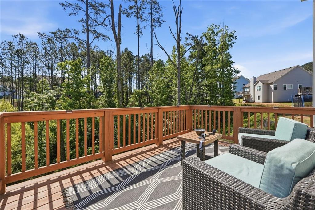 166 Ashbridge Lane Dallas, GA 30132 - Photo 29 of 35 a view of a chairs on wooden deck