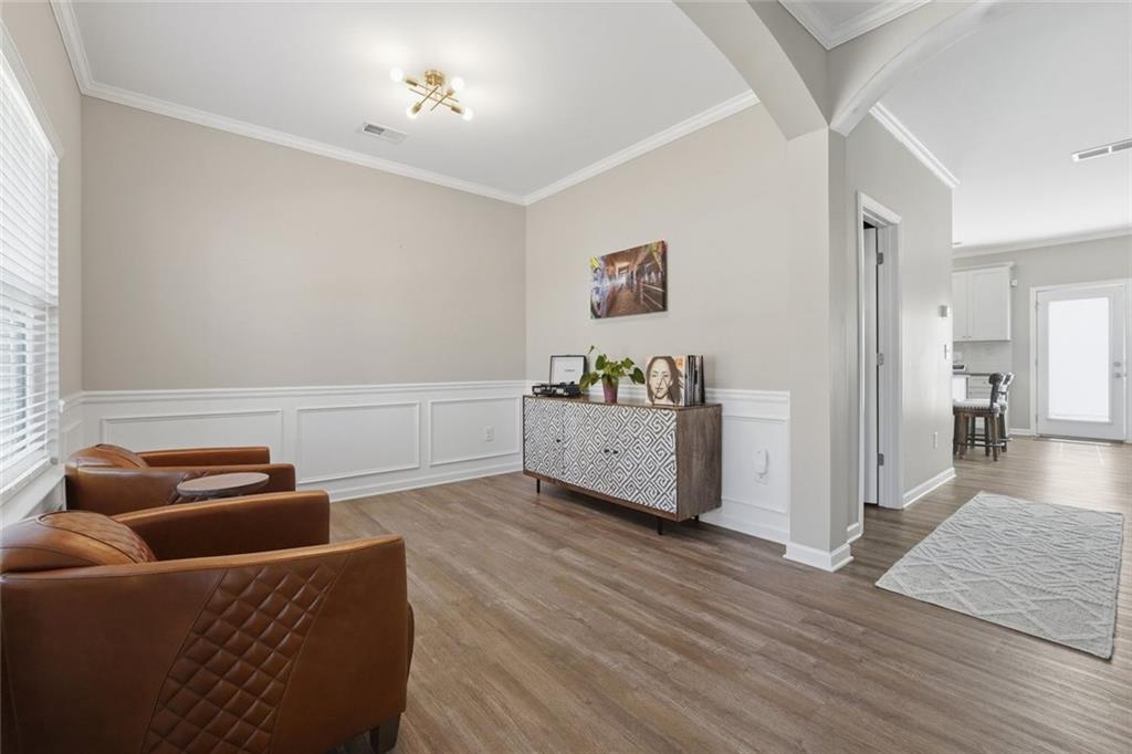 166 Ashbridge Lane Dallas, GA 30132 - Photo 5 of 35 a living room with furniture and a wooden floor