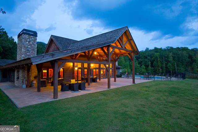 a view of a lake in middle of forest