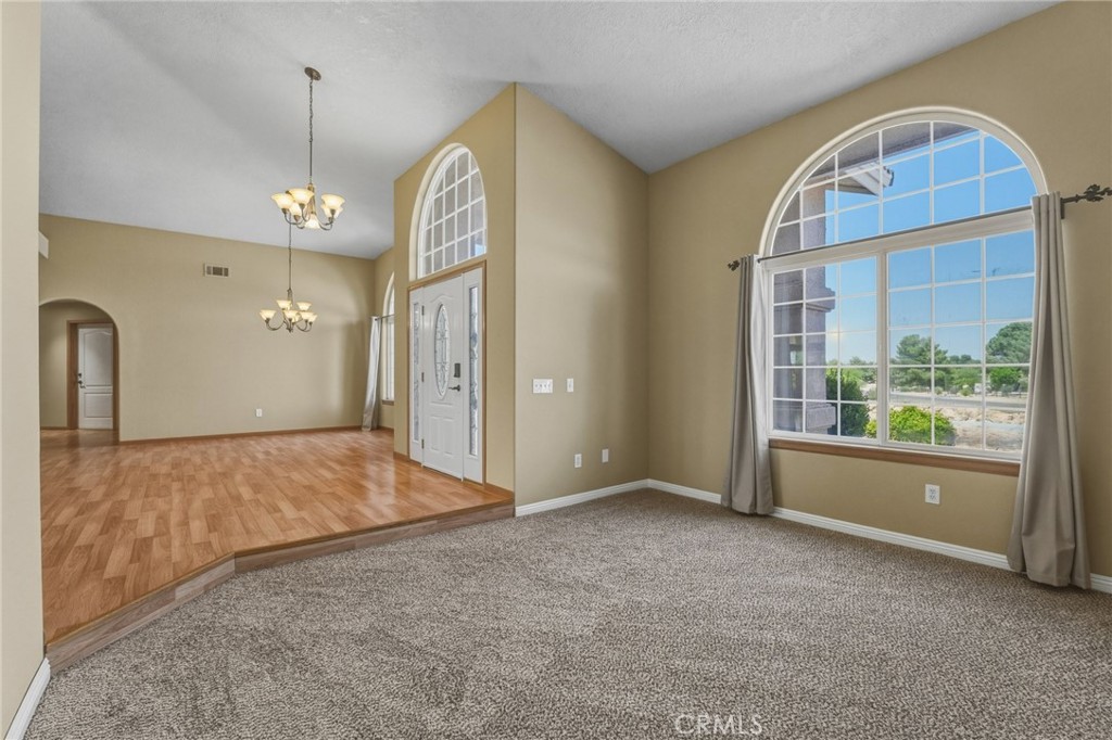 19501 Kinai Road Apple Valley, CA 92307 - Photo 10 of 49 a view of an empty room and window