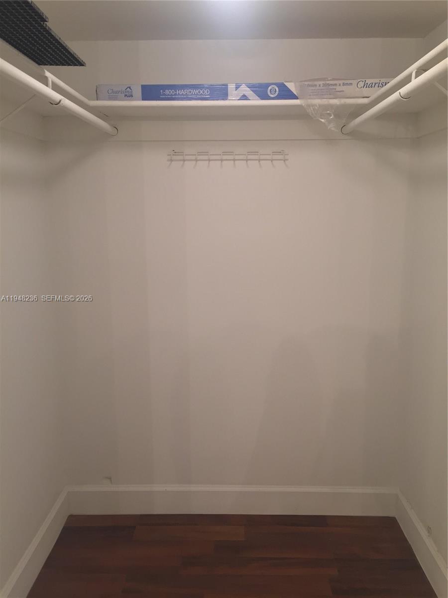 9225 Southwest 87th Avenue, Unit A8 Miami, FL 33176 - Photo 10 of 14 a view of an empty walk in closet