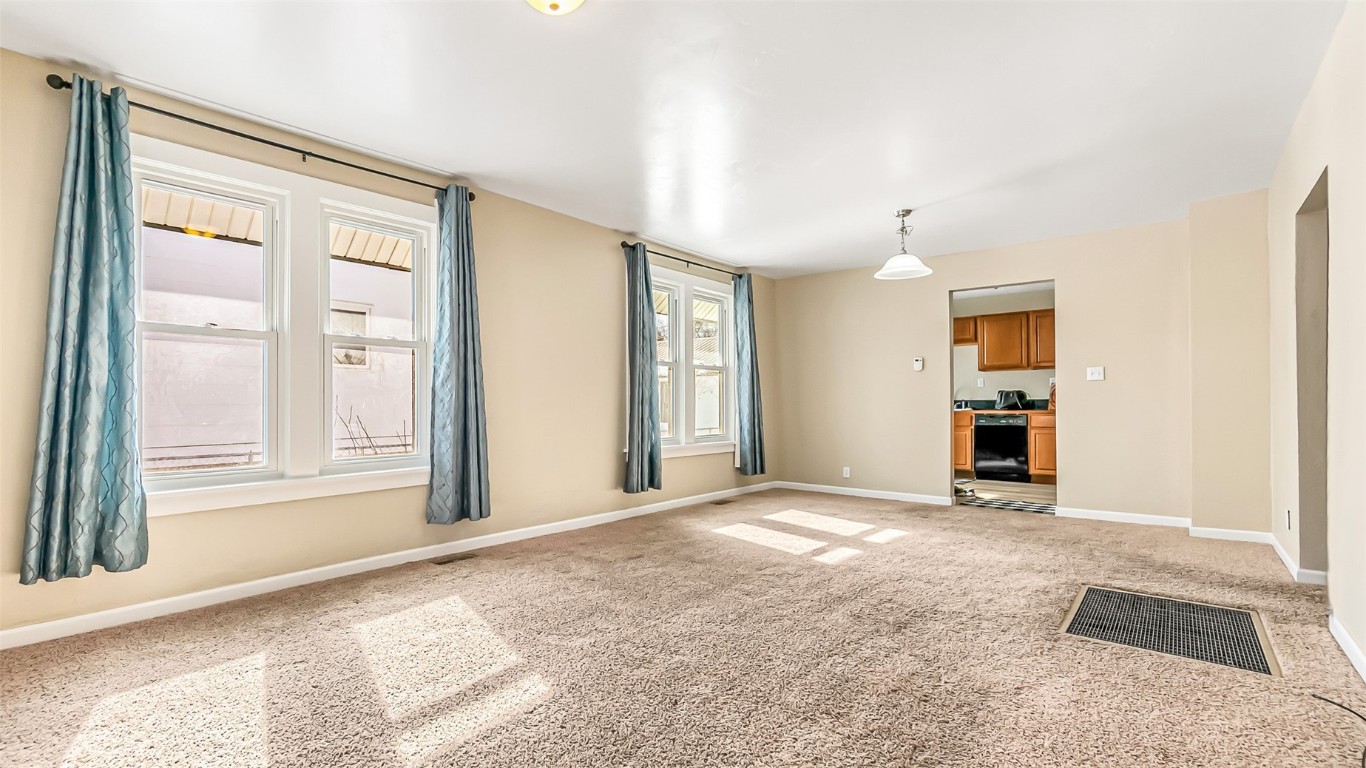 694 Russell Street Craig, CO 81625 - Photo 18 of 40 an empty room with windows and closet