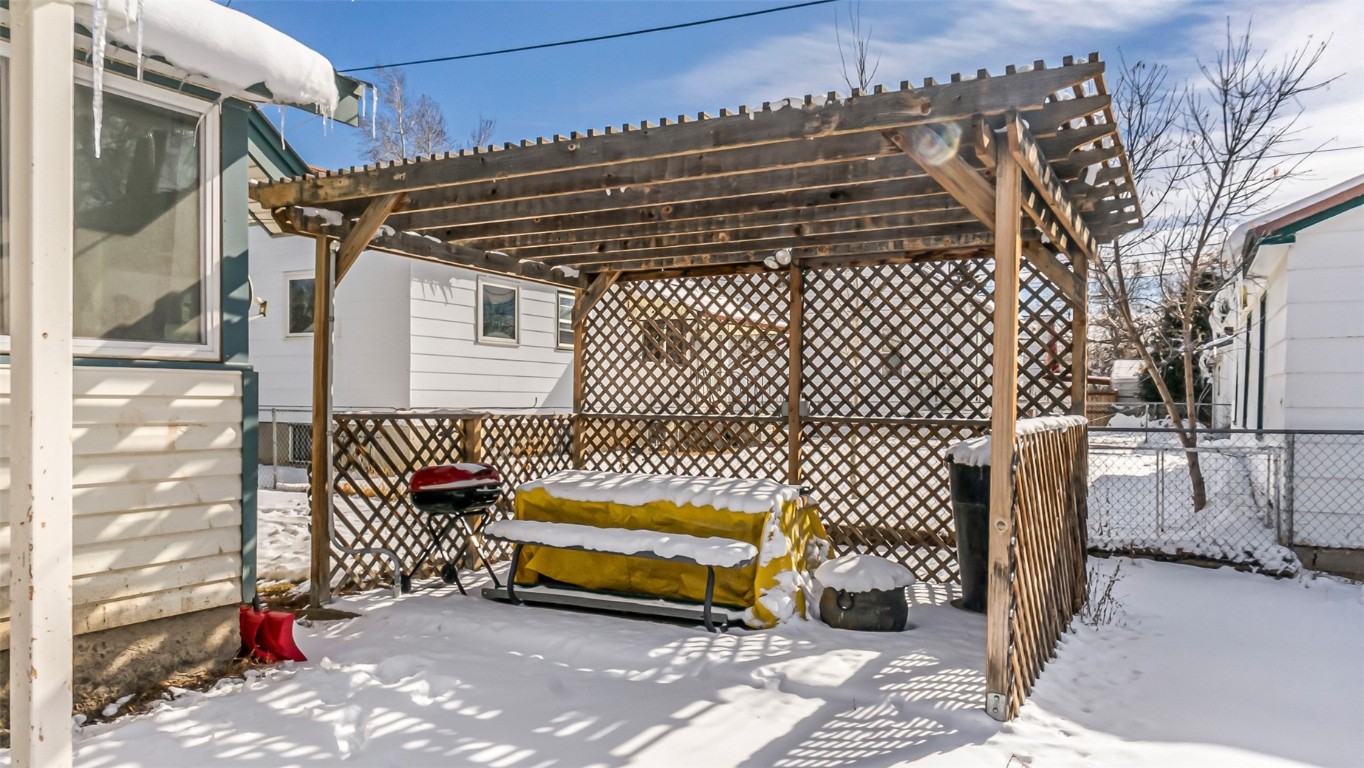 694 Russell Street Craig, CO 81625 - Photo 3 of 40 a view of a patio with table and chairs