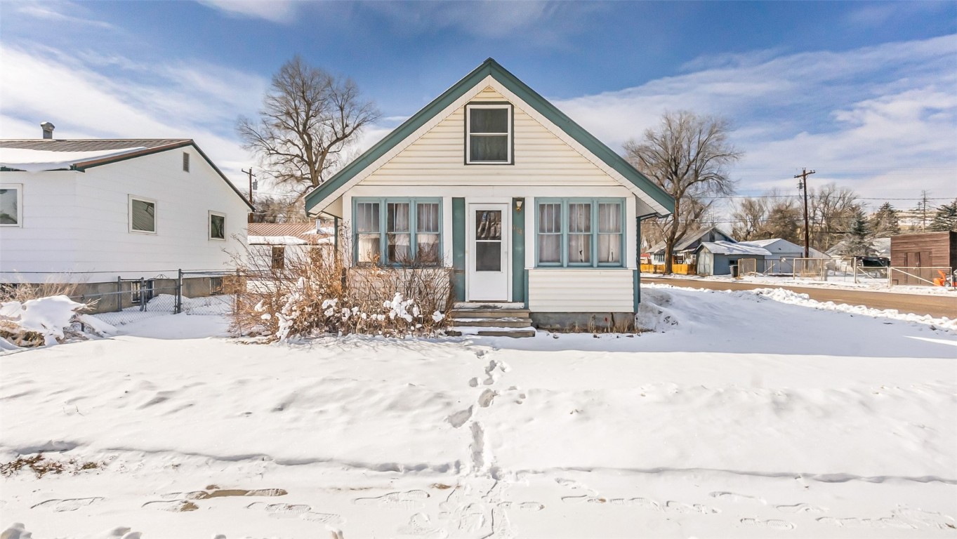 694 Russell Street Craig, CO 81625 - Photo 33 of 40 a view of a house with snow on the road
