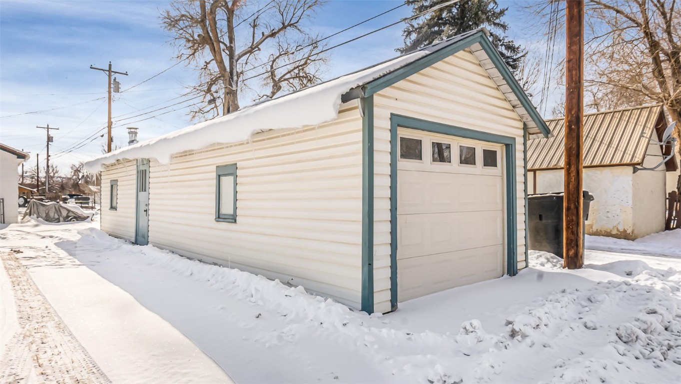 694 Russell Street Craig, CO 81625 - Photo 35 of 40 a view of a house with a wooden fence