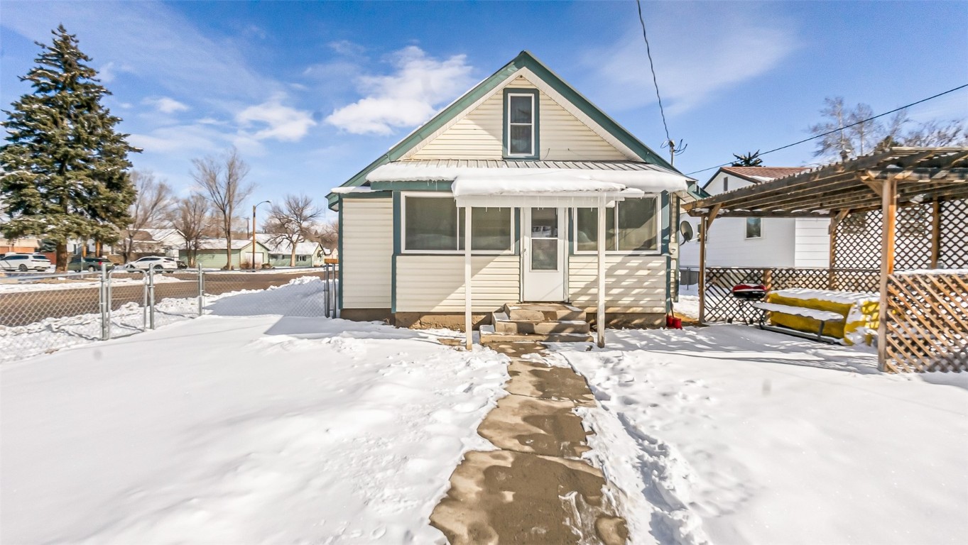 694 Russell Street Craig, CO 81625 - Photo 37 of 40 a view of a house with snow on the road