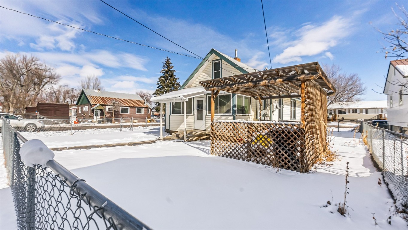 694 Russell Street Craig, CO 81625 - Photo 38 of 40 a view of a house with wooden fence