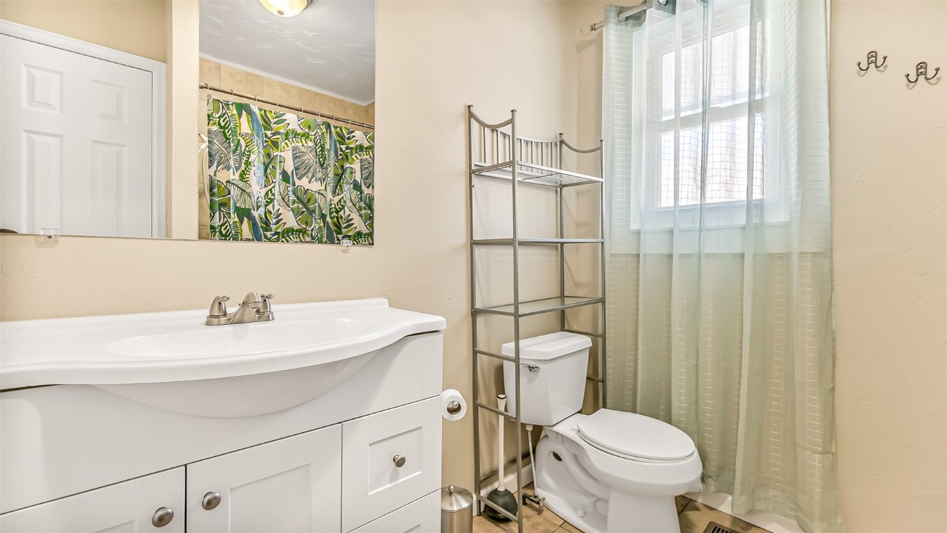 694 Russell Street Craig, CO 81625 - Photo 7 of 40 a bathroom with a sink a toilet and a mirror