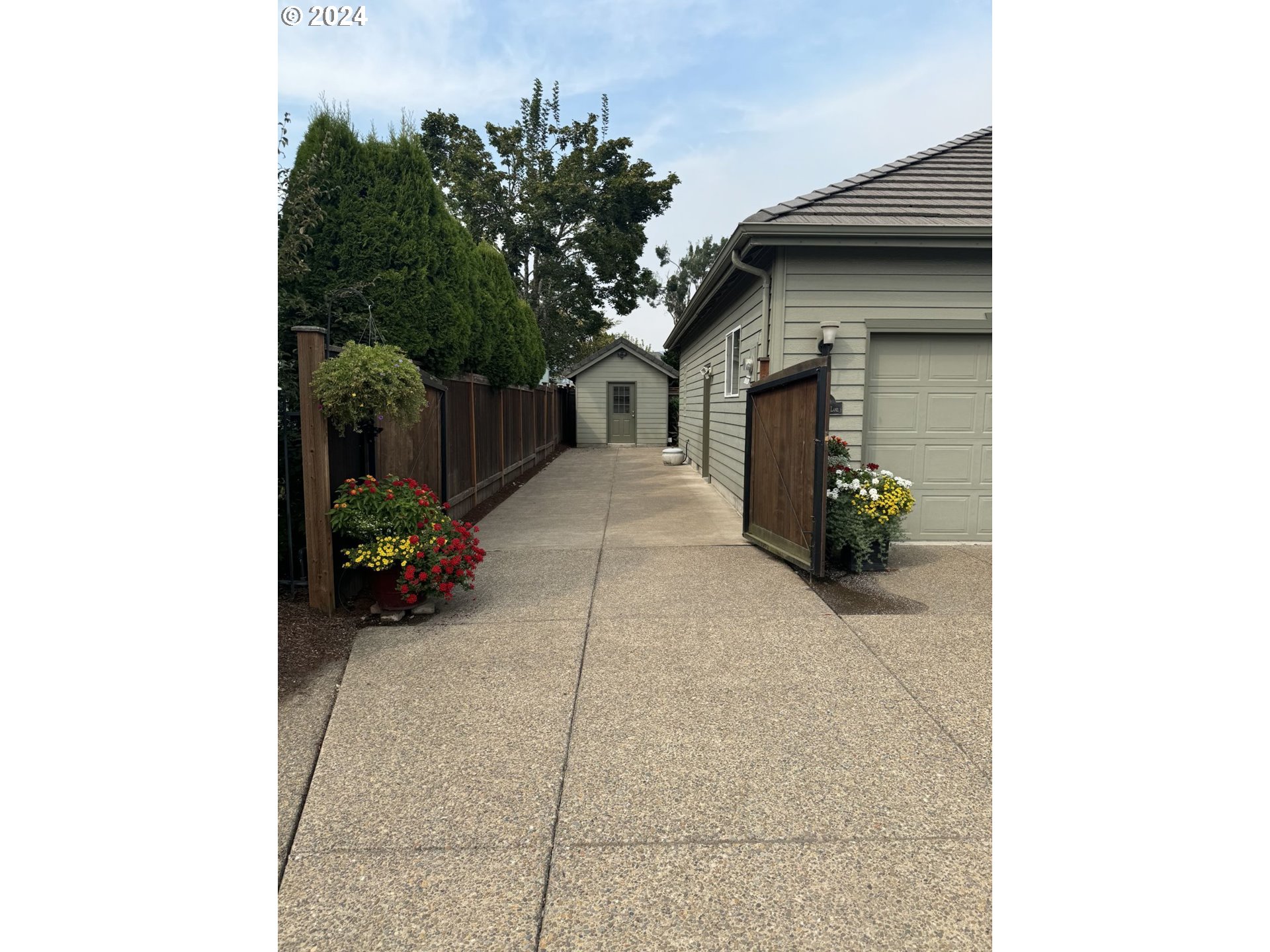 990 Old Orchard Lane Springfield, OR 97477 - Photo 2 of 16 a house with a outdoor space