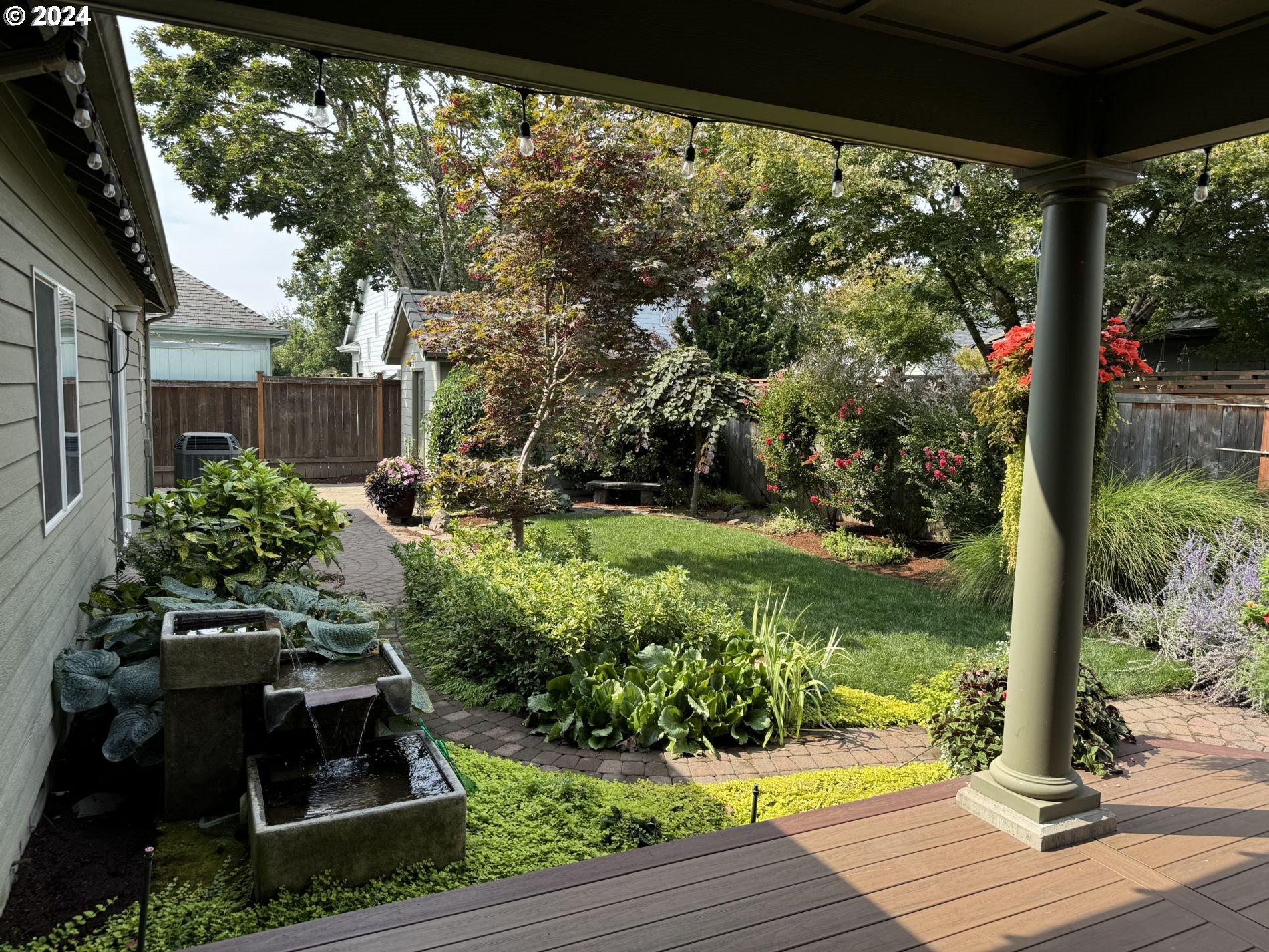 990 Old Orchard Lane Springfield, OR 97477 - Photo 7 of 16 a view of a garden from a patio