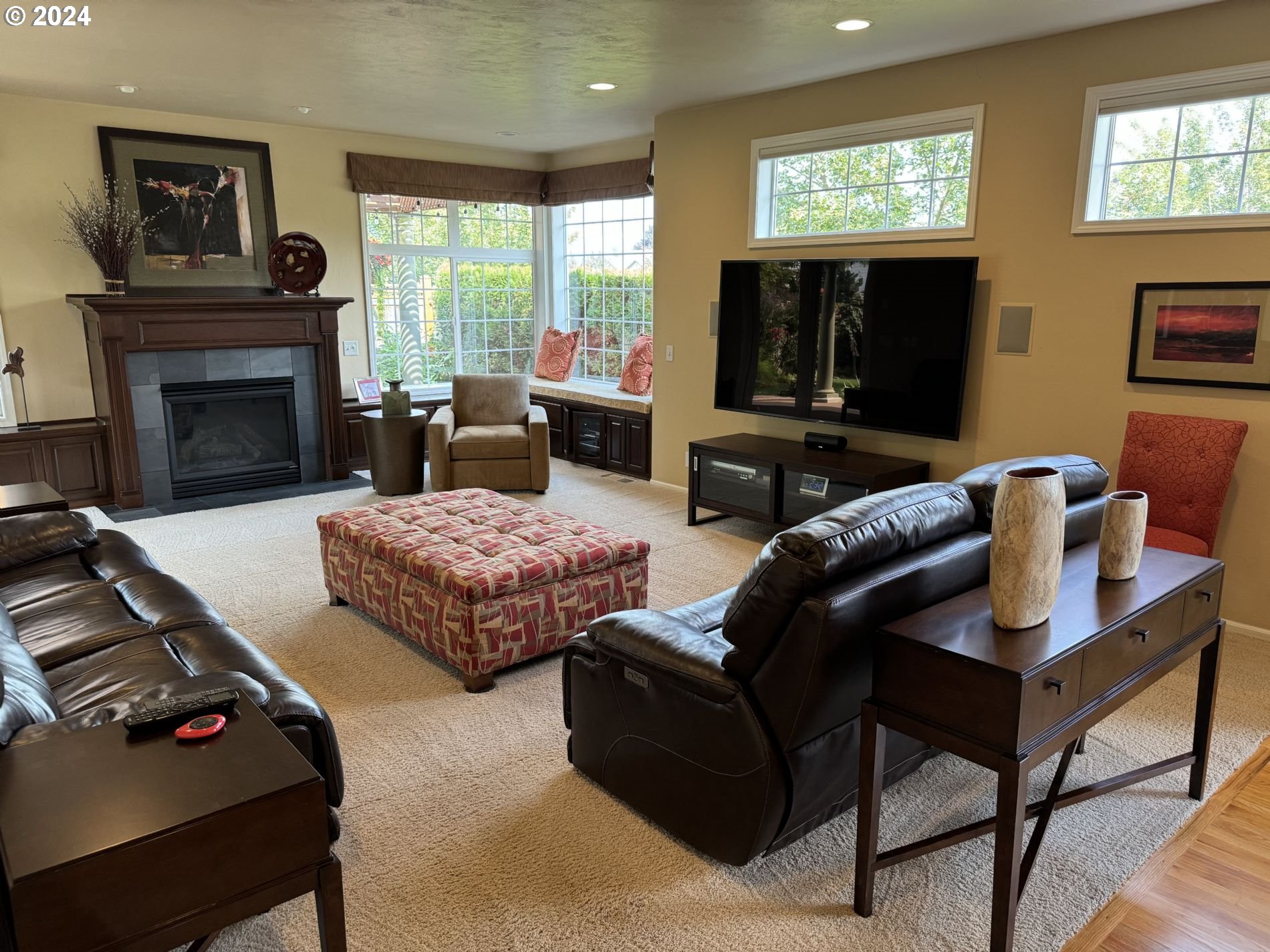 990 Old Orchard Lane Springfield, OR 97477 - Photo 10 of 16 a living room with furniture fireplace and flat screen tv