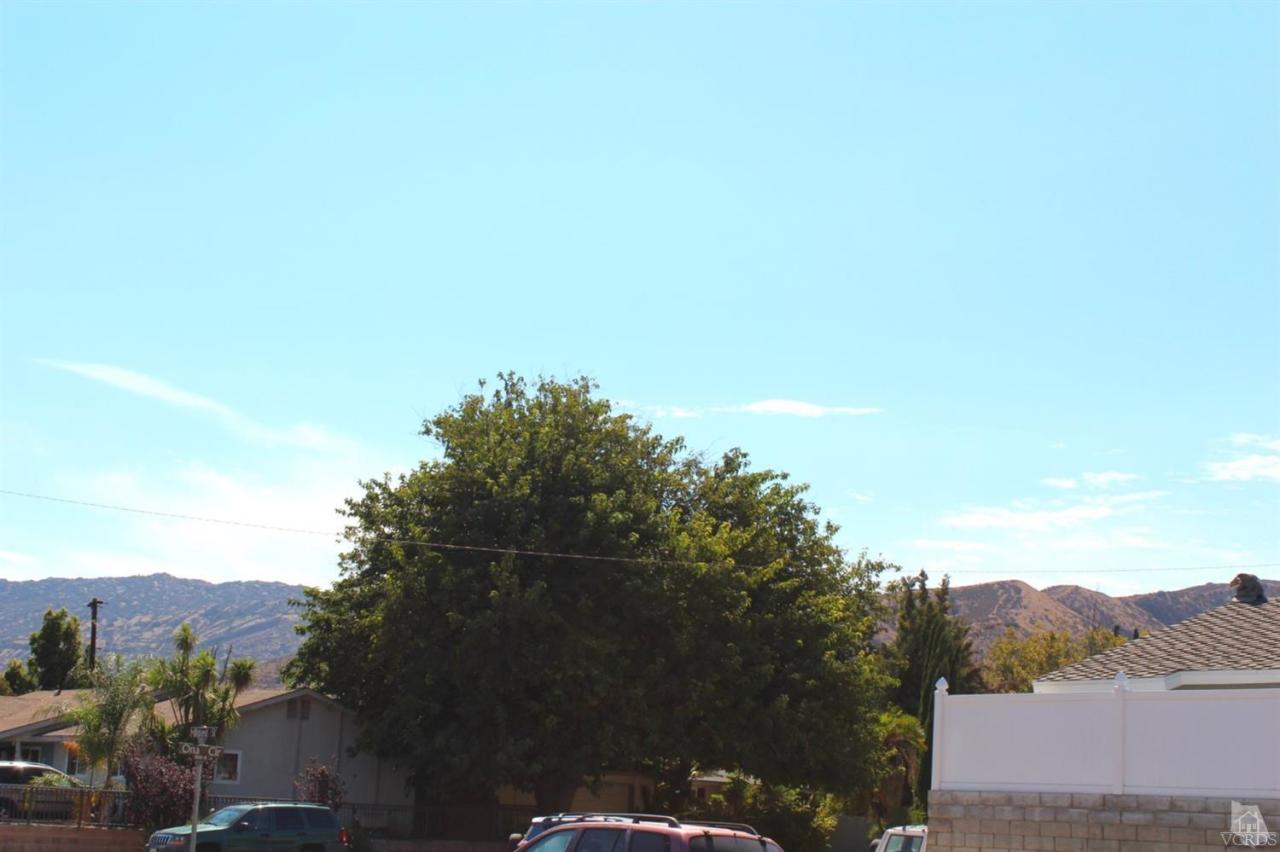 5317 Mildred Street Simi Valley, CA 93063 - Photo 15 of 16 a view of a city with lush green forest