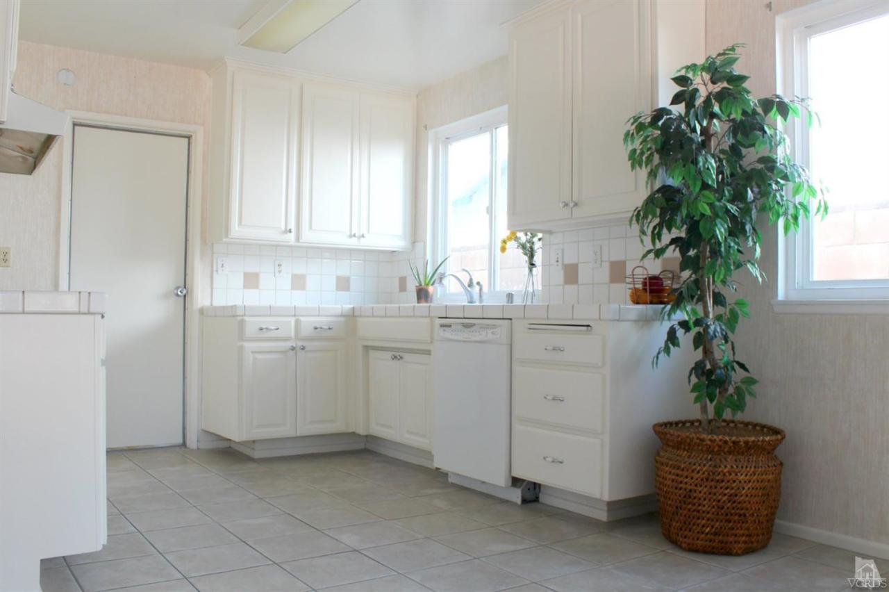 5317 Mildred Street Simi Valley, CA 93063 - Photo 4 of 16 a room with a potted plant a sink and a window