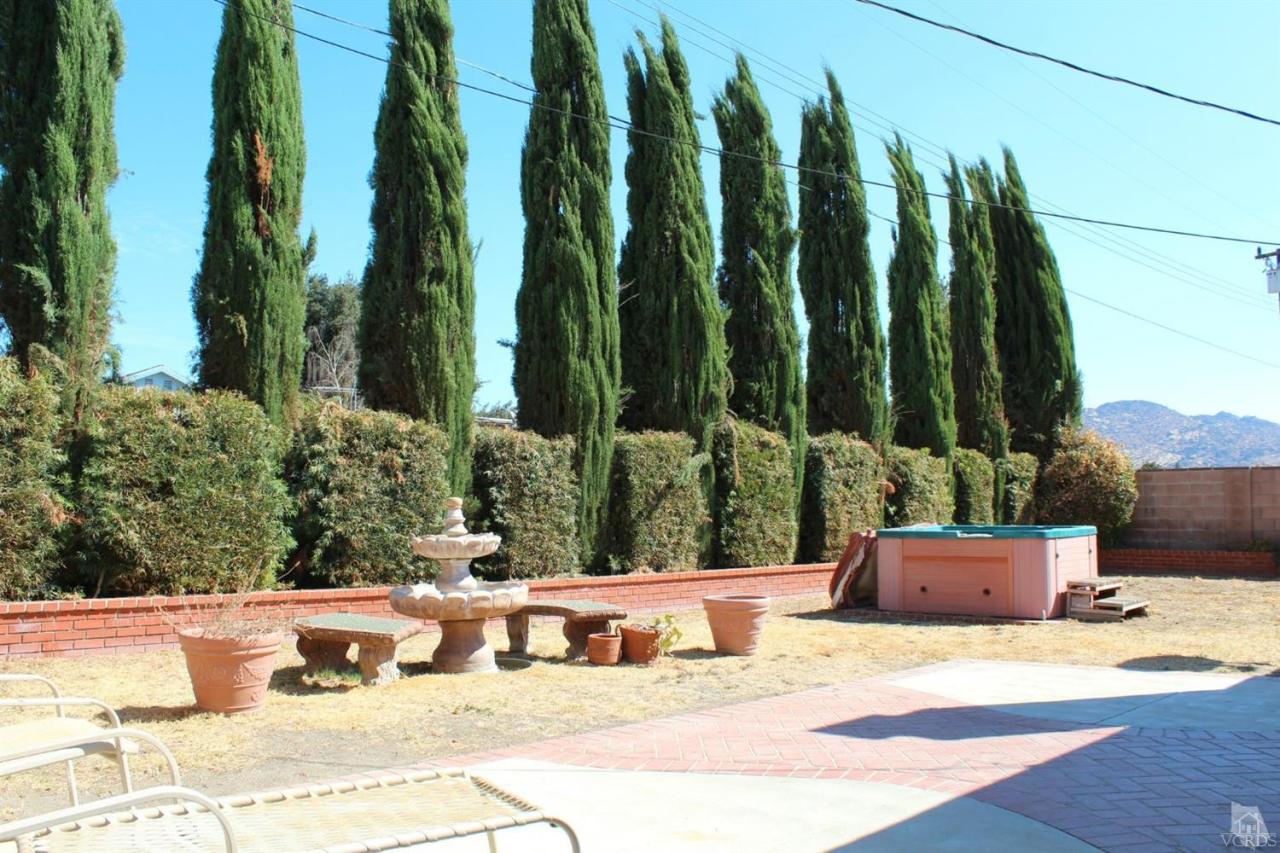 5317 Mildred Street Simi Valley, CA 93063 - Photo 7 of 16 a view of a yard with plants