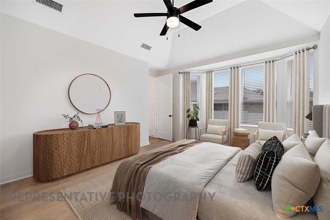 120 Fox Run Georgetown, TX 78628 - Photo 4 of 30 a bedroom with bed and a window