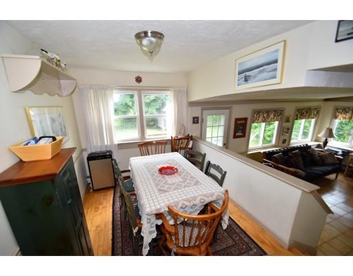 33 Wyola Road Hull, MA 02045 - Photo 5 of 16 a living room with furniture and a large window