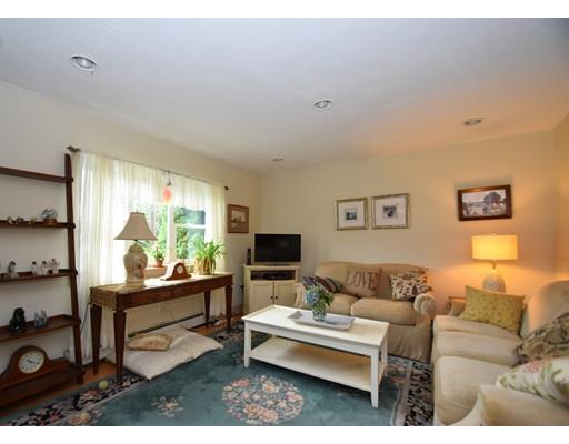 33 Wyola Road Hull, MA 02045 - Photo 6 of 16 a living room with furniture and a flat screen tv