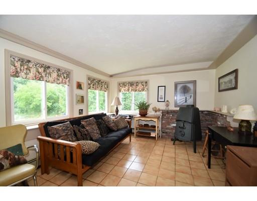 33 Wyola Road Hull, MA 02045 - Photo 8 of 16 a living room with furniture and a large window