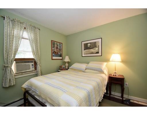 33 Wyola Road Hull, MA 02045 - Photo 10 of 16 a bedroom with a bed and a window