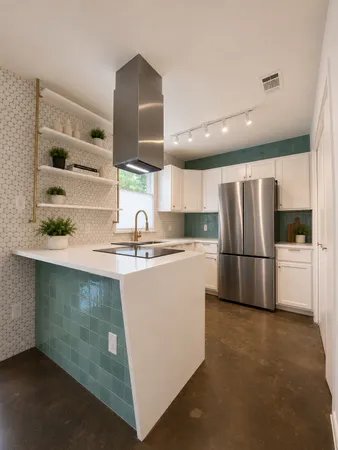 a kitchen with refrigerator and stove