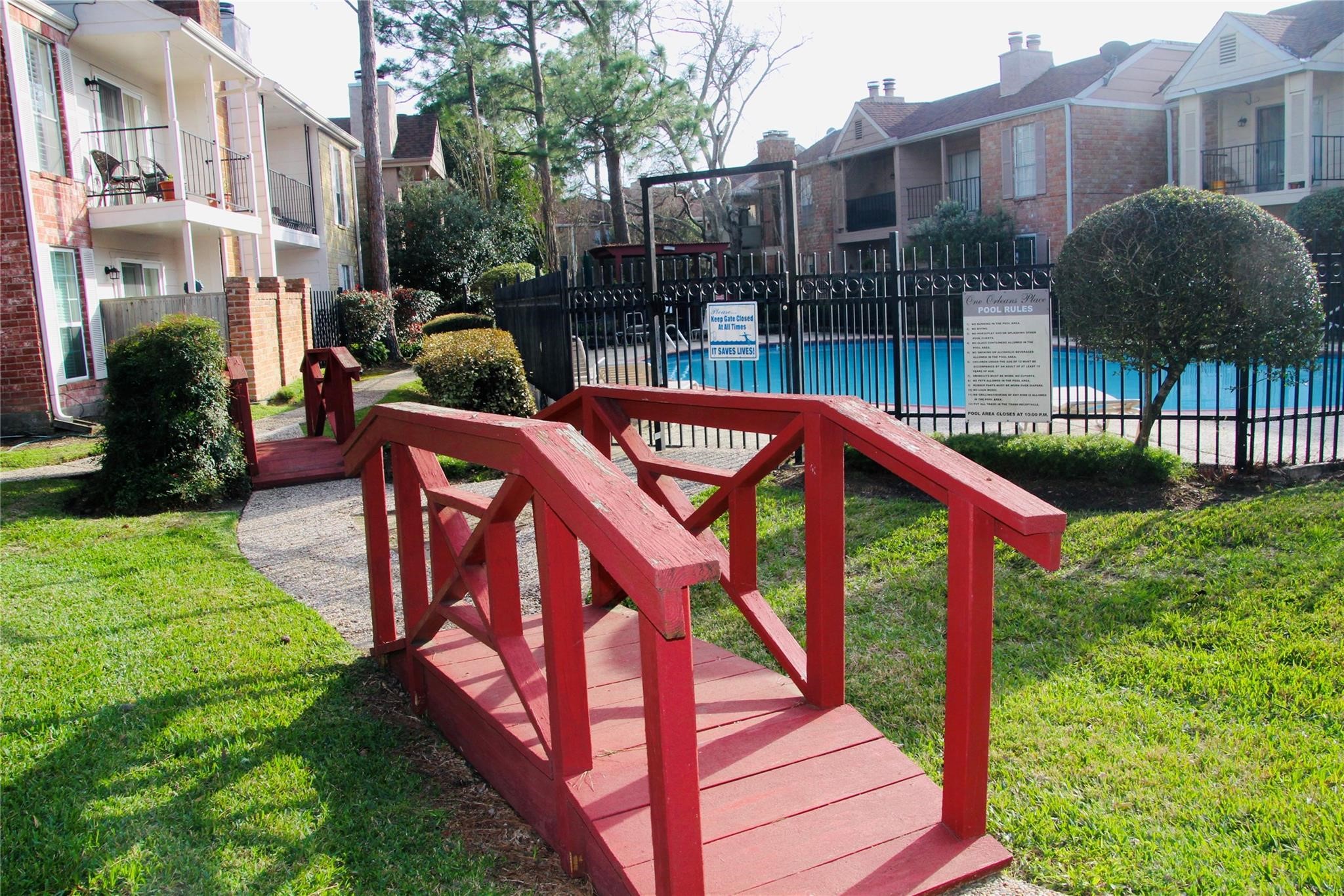 2800 Jeanetta Street, Unit 1702 Houston, TX 77063 - Photo 20 of 23 a view of a roof deck with couches and wooden fence
