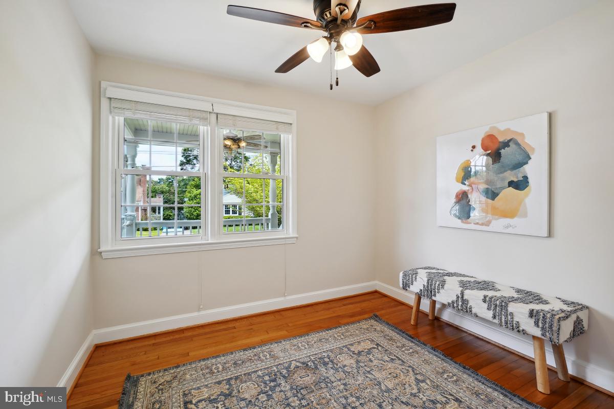 8610 Melwood Road Bethesda, MD 20817 - Photo 25 of 44 a bed room with a bed and a window