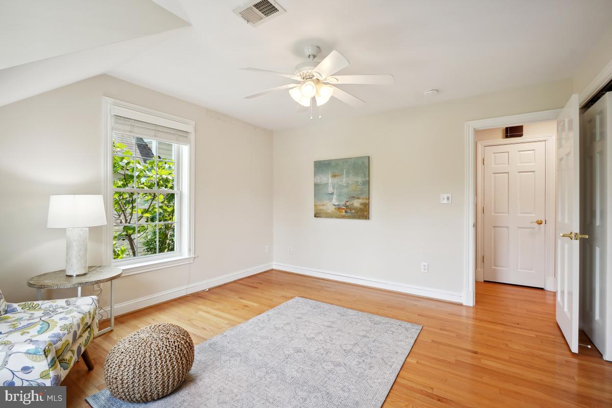8610 Melwood Road Bethesda, MD 20817 - Photo 33 of 44 a bedroom with a bed and a window