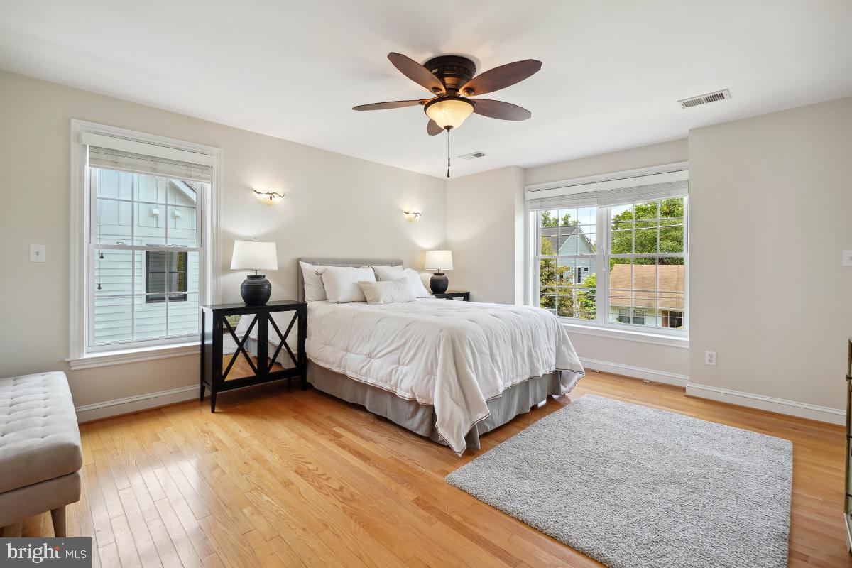 8610 Melwood Road Bethesda, MD 20817 - Photo 36 of 44 a bedroom with a bed and a window