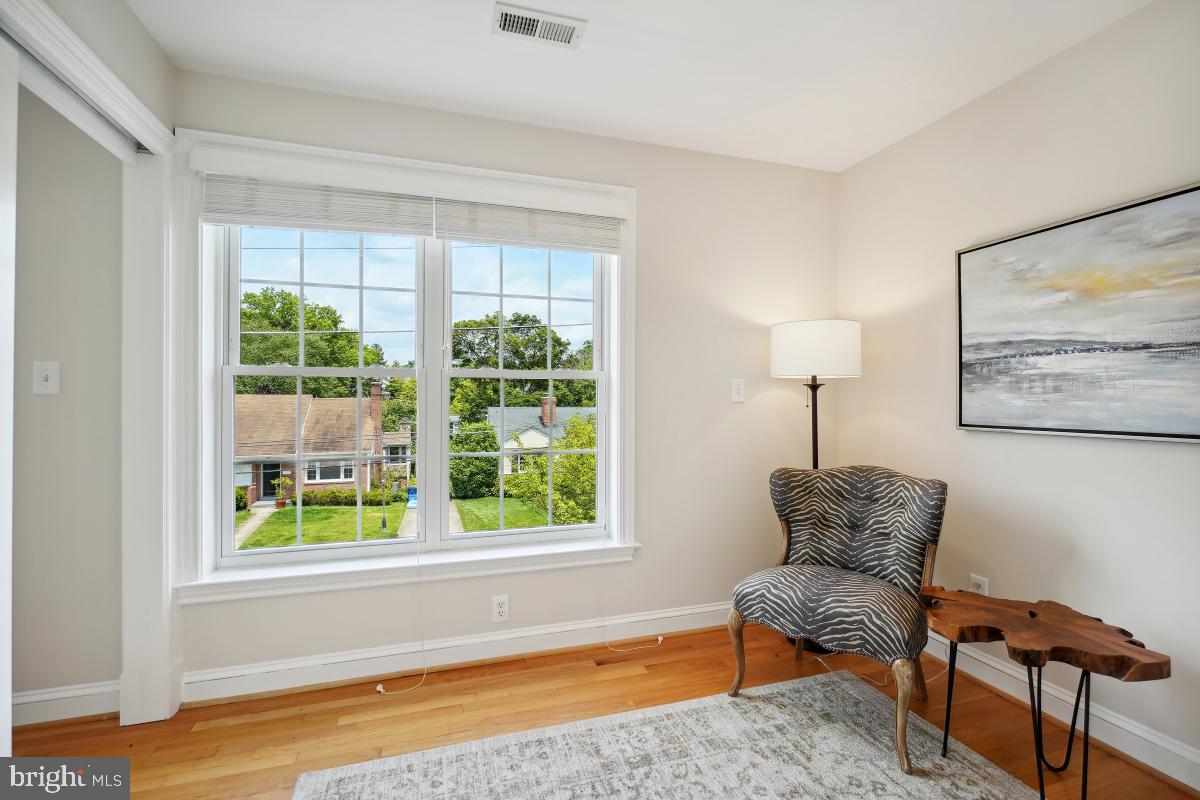 8610 Melwood Road Bethesda, MD 20817 - Photo 38 of 44 a living room with furniture and a window