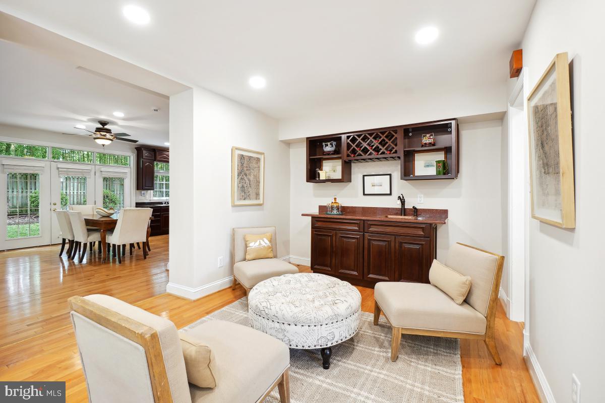 8610 Melwood Road Bethesda, MD 20817 - Photo 8 of 44 a living room with furniture and a toilet